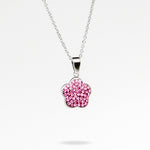 Silver chain with pink colored rhinestone flower shaped charm