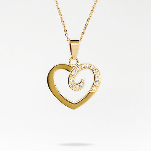 Gold chain with gold and rhinestone heart shaped charm